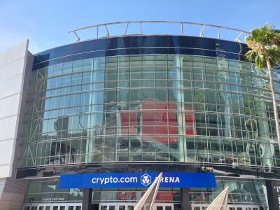 Glass facade and entrance of Crypto.com Arena in Los Angeles.